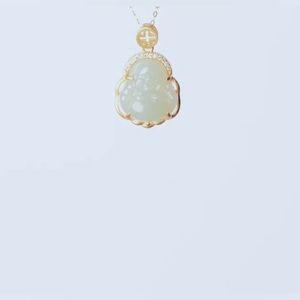 Jade Buddha pendant .924 sterling silver chain not included only the pendant